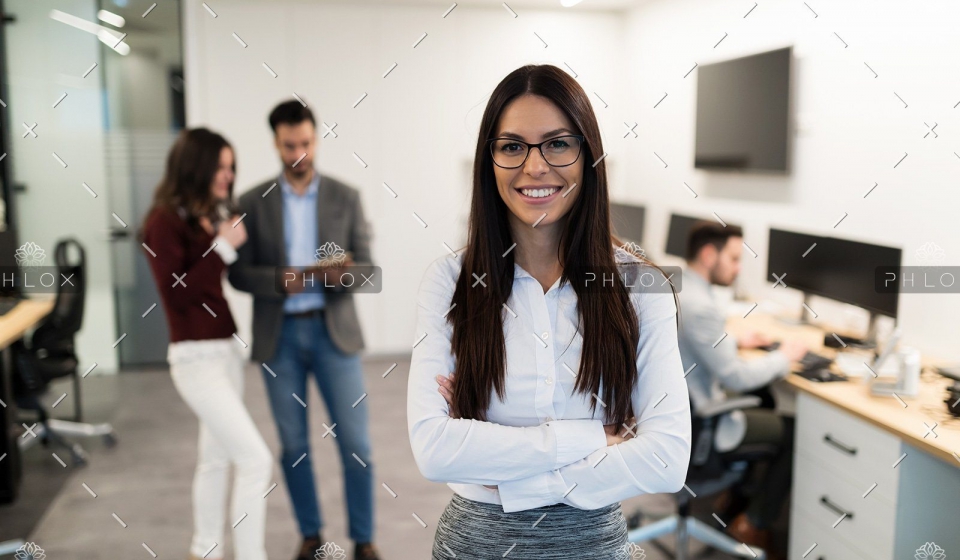demo-attachment-472-portrait-of-young-businesswoman-posing-in-office-WEU5FBG